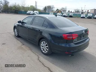 2015 Volkswagen Jetta Sedan 1.8T SE with VIN 3VWD17AJ0FM218263, listed as a IAAI auction lot 42083017 with 194,850 mi miles. Bid and sale history available at carsss.com. Image 3.