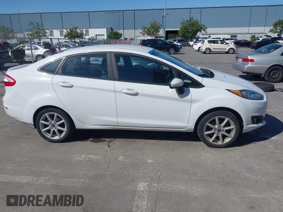 2019 Ford Fiesta SE z VIN 3FADP4BJ6KM143891, wystawiony jako IAAI lot #42244796 z przebiegiem 62 143 mil mil oraz . Historia ofert i sprzedaży dostępna na DreamBid. Obrazek 14.