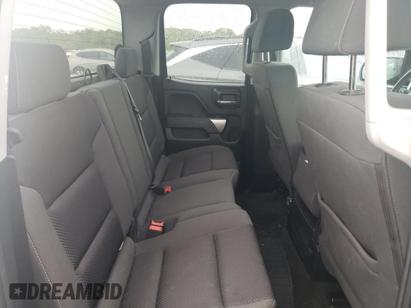 2018 Chevrolet Silverado 1500 LT with VIN 1GCVKREH8JZ102484, listed as a Copart auction lot 55114225 with 59,185 mi miles and Salvage Title. Bid and sale history available at DreamBid. Image 10.