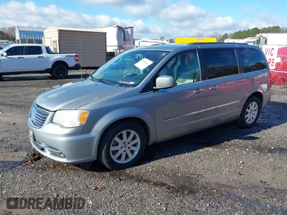 2013 Chrysler Town & Country Touring z VIN 2C4RC1BG8DR775222, wystawiony jako IAAI lot #41080043 z przebiegiem 248 000 mil mil oraz . Historia ofert i sprzedaży dostępna na DreamBid. Obrazek 2.