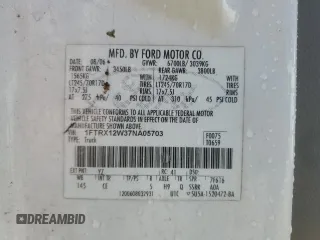2007 Ford F-150 STX with VIN 1FTRX12W37NA05703, listed as a Copart auction lot 51927885 with 206,593 mi miles and Salvage Title. Bid and sale history available at DreamBid. Image 12.