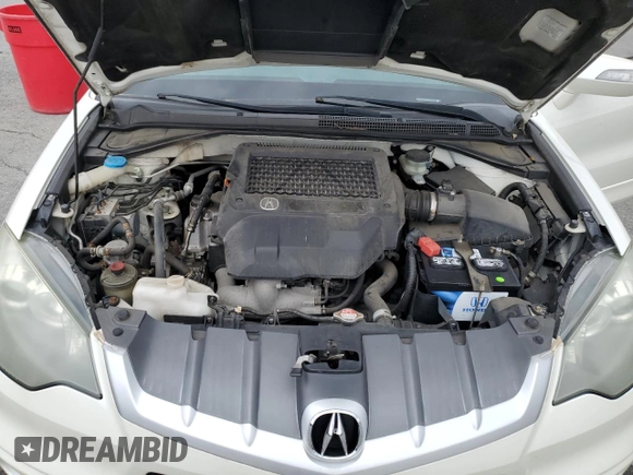 2009 Acura RDX Technology z VIN 5J8TB18549A008060, wystawiony jako Copart lot #50881085 z przebiegiem 101 968 mil mil oraz Szkoda całkowita • Salvage title. Historia ofert i sprzedaży dostępna na DreamBid. Obrazek 13.