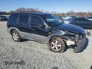 2005 Mazda Tribute i with VIN 4F2YZ02Z05KM38128, listed as a Copart auction lot 83175604 with 320,405 mi miles and Salvage Title. Bid and sale history available at carsss.com. Image 4.