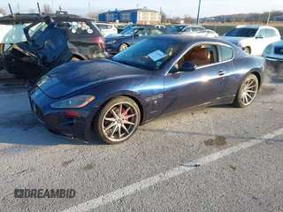 2008 Maserati GranTurismo with VIN ZAMGJ45A680041406, listed as a IAAI auction lot 41230930 with 59,518 mi miles. Bid and sale history available at carsss.com. Image 2.