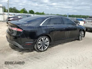2019 Lincoln MKZ Reserve II z VIN 3LN6L5E98KR617764, wystawiony jako Copart lot #53246005 z przebiegiem 108 017 mil mil oraz Tytuł czysty. Historia ofert i sprzedaży dostępna na DreamBid. Obrazek 3.