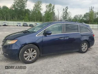 2014 Honda Odyssey EX-L with VIN 5FNRL5H63EB013483, listed as a Copart auction lot 63002435 with 127,059 mi miles and Salvage title. Bid and sale history available at DreamBid. Image 1.