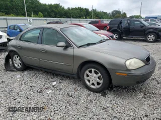 2001 Mercury Sable with VIN 1MEFM53U01A627026, listed as a Copart auction lot 57355804 with 248,244 mi miles and Salvage title. Bid and sale history available at DreamBid. Image 4.