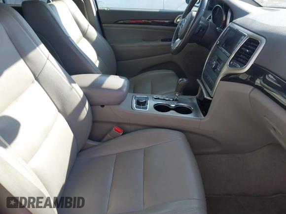 2011 Jeep Grand Cherokee 70th Anniversary with VIN 1J4RR4GTXBC718994, listed as a IAAI auction lot 41688158 with 121,680 mi miles. Bid and sale history available at carsss.com. Image 5.