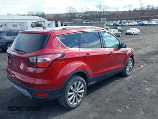 2017 Ford Escape Titanium with VIN 1FMCU0JD9HUC71738, listed as a IAAI auction lot 41673228 with 173,615 mi miles. Bid and sale history available at carsss.com. Image 4.
