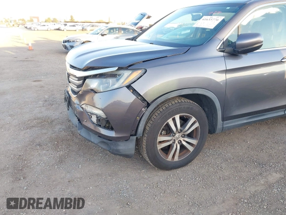 2017 Honda Pilot EX-L with VIN 5FNYF5H74HB010026, listed as a IAAI auction lot 41633770 with 170,383 mi miles and . Bid and sale history available at DreamBid. Image 20.