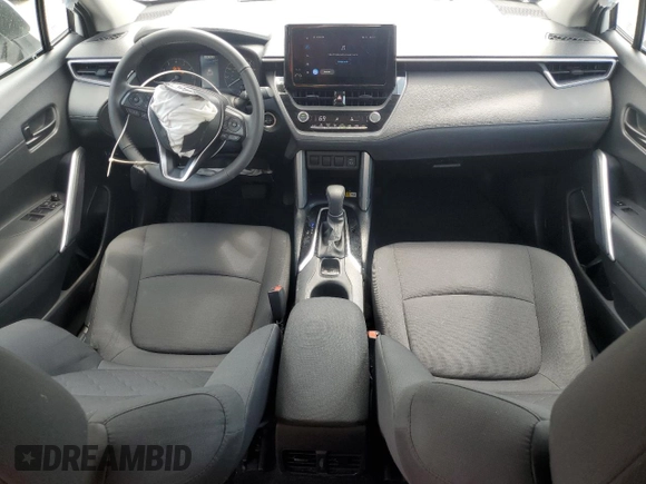 2023 Toyota Corolla Cross LE with VIN 7MUCAAAG2PV053730, listed as a Copart auction lot 54825035 with 33,313 mi miles and Salvage title. Bid and sale history available at DreamBid. Image 8.