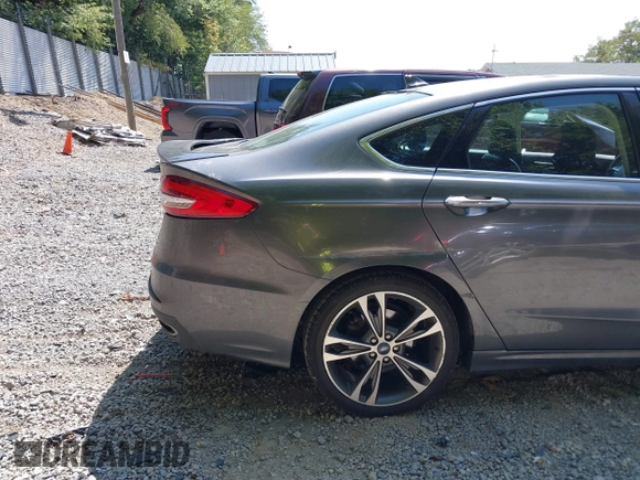 2019 Ford Fusion Titanium with VIN 3FA6P0D93KR124299, listed as a IAAI auction lot 40182478 with 73,408 mi miles. Bid and sale history available at carsss.com. Image 20.