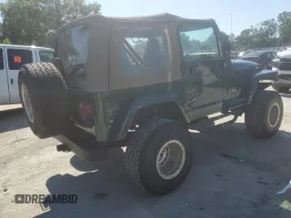 1999 Jeep Wrangler Sahara with VIN 1J4FY49S6XP478675, listed as a Copart auction lot 52147605 with 157,971 mi miles and Salvage Title. Bid and sale history available at carsss.com. Image 3.