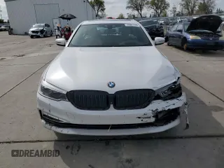 2018 BMW 5 Series 530e xDrive with VIN WBAJB1C58JB084907, listed as a Copart auction lot 49901795 with 109,617 mi miles and Salvage title. Bid and sale history available at DreamBid. Image 5.