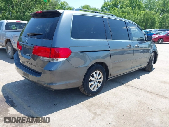 2010 Honda Odyssey EX-L z VIN 5FNRL3H76AB071871, wystawiony jako IAAI lot #42214867 z przebiegiem 255 116 mil mil oraz . Historia ofert i sprzedaży dostępna na DreamBid. Obrazek 4.