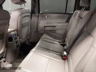 2011 Honda Pilot Touring with VIN 5FNYF4H97BB099528, listed as a IAAI auction lot 41721800 with 132,979 mi miles. Bid and sale history available at carsss.com. Image 8.
