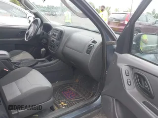 2006 Ford Escape XLS z VIN 1FMYU02Z66KA53989, wystawiony jako IAAI lot #42783537 z przebiegiem 95 833 mil mil oraz . Historia ofert i sprzedaży dostępna na DreamBid. Obrazek 5.