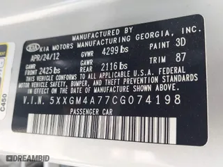 2012 Kia Optima LX with VIN 5XXGM4A77CG074198, listed as a IAAI auction lot 41927738 with 163,697 mi miles. Bid and sale history available at carsss.com. Image 9.