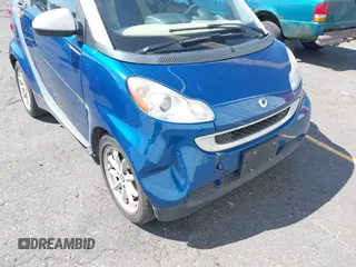 2009 Smart fortwo Pure with VIN WMEEJ31X19K243304, listed as a IAAI auction lot 42860139 with 119,617 mi miles and . Bid and sale history available at DreamBid. Image 6.