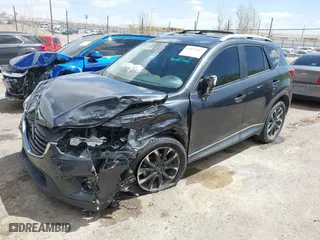 2016 Mazda CX-5 Grand Touring with VIN JM3KE4DY7G0643643, listed as a IAAI auction lot 42077497 with 120,343 mi miles. Bid and sale history available at carsss.com. Image 18.
