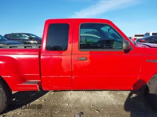 1999 Ford Ranger XL with VIN 1FTZR15V2XTA07631, listed as a IAAI auction lot 41591752 with 179,967 mi miles. Bid and sale history available at carsss.com. Image 13.