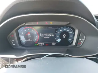2021 Audi Q3 Premium with VIN WA1AUCF32M1066149, listed as a IAAI auction lot 40695269 with 92,598 mi miles and . Bid and sale history available at DreamBid. Image 7.