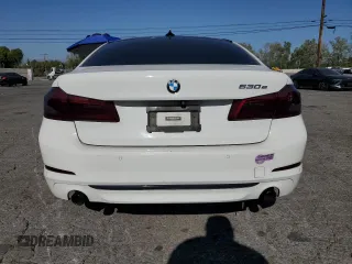 2019 BMW 5 Series 530e с VIN WBAJA9C54KB389629, выставлен на аукционе Copart как лот 52256265 с пробегом 112 642 миль миль и Списание • Salvage title. История ставок и продаж доступна на DreamBid. Изображение 6.