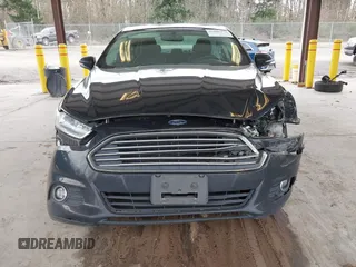 2016 Ford Fusion SE Hybrid with VIN 3FA6P0LU1GR106980, listed as a IAAI auction lot 41895379 with 200,226 mi miles. Bid and sale history available at carsss.com. Image 6.