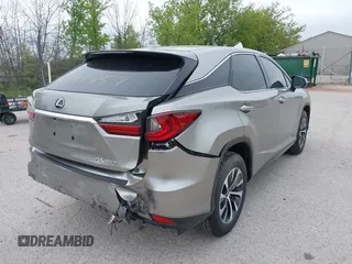 2022 Lexus RX 350 with VIN 2T2AZMDA7NC352957, listed as a IAAI auction lot 42297457 with 34,576 mi miles and . Bid and sale history available at DreamBid. Image 6.