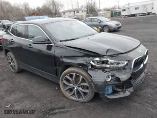 2019 BMW X2 xDrive28i with VIN WBXYJ5C50K5N03198, listed as a IAAI auction lot 41999528 with 28,949 mi miles. Bid and sale history available at carsss.com. Image 1.