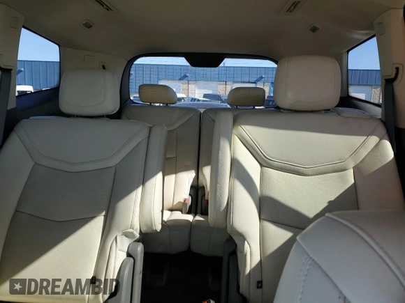 2023 Cadillac XT6 AWD Premium Luxury z VIN 1GYKPDRS0PZ112068, wystawiony jako Copart lot #46538575 z przebiegiem 52 016 mil mil oraz Szkoda całkowita • Salvage title. Historia ofert i sprzedaży dostępna na DreamBid. Obrazek 10.