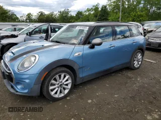 2017 MINI Clubman Cooper S z VIN WMWLU5C5XH2E83566, wystawiony jako Copart lot #57919305 z przebiegiem 89 983 mil mil oraz Tytuł czysty. Historia ofert i sprzedaży dostępna na DreamBid. Obrazek 1.