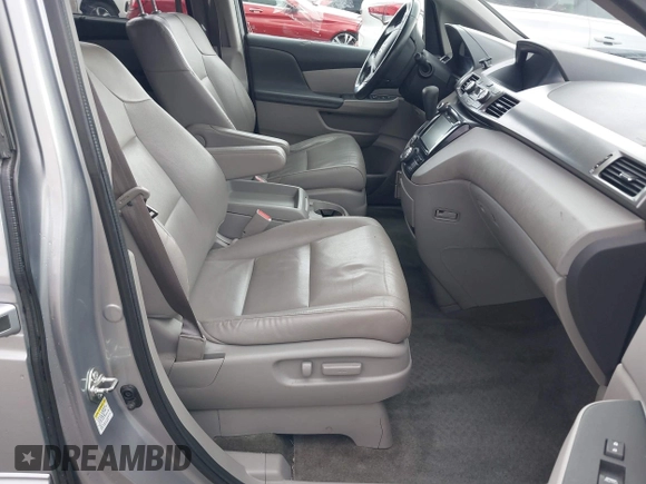 2016 Honda Odyssey EX-L with VIN 5FNRL5H64GB048004, listed as a IAAI auction lot 41676712 with 129,343 mi miles. Bid and sale history available at carsss.com. Image 5.