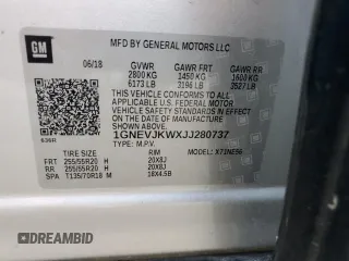2018 Chevrolet Traverse Premier z VIN 1GNEVJKWXJJ280737, wystawiony jako Copart lot #55680005 z przebiegiem 83 098 mil mil oraz Szkoda całkowita • Salvage title. Historia ofert i sprzedaży dostępna na DreamBid. Obrazek 13.