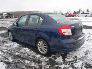 2009 Suzuki SX4 Sport FWD with VIN JS2YC414196202090, listed as a IAAI auction lot 41582385 with 160,838 mi miles and . Bid and sale history available at DreamBid. Image 3.
