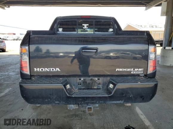 2007 Honda Ridgeline RTL z VIN 2HJYK16517H545034, wystawiony jako Copart lot #59819385 z przebiegiem 258 928 mil mil oraz Czysty tytuł • Clean title. Historia ofert i sprzedaży dostępna na DreamBid. Obrazek 6.