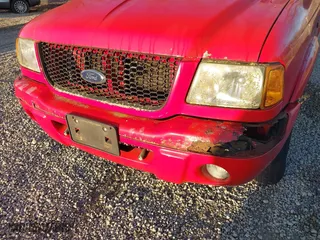 2003 Ford Ranger XL with VIN 1FTYR10U83PB47275, listed as a IAAI auction lot 41826628 with 214,845 mi miles. Bid and sale history available at carsss.com. Image 6.