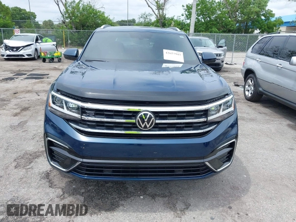 2021 Volkswagen Atlas SE with VIN 1V2PE2CA7MC201509, listed as a IAAI auction lot 42657943 with 71,197 mi miles and . Bid and sale history available at DreamBid. Image 12.
