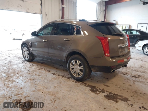 2015 Cadillac SRX Luxury Collection with VIN 3GYFNBE34FS575613, listed as a IAAI auction lot 41697251 with 173,117 mi miles and . Bid and sale history available at DreamBid. Image 3.