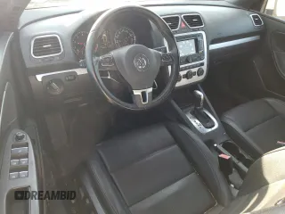 2015 Volkswagen Eos Komfort with VIN WVWBW8AH1FV000692, listed as a Copart auction lot 77866694 with 114,156 mi miles and Salvage Title. Bid and sale history available at DreamBid. Image 8.