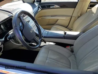 2015 Lincoln MKZ z VIN 3LN6L2JK1FR604092, wystawiony jako Copart lot #48379525 z przebiegiem 64 656 mil mil oraz Szkoda całkowita • Salvage title. Historia ofert i sprzedaży dostępna na DreamBid. Obrazek 7.