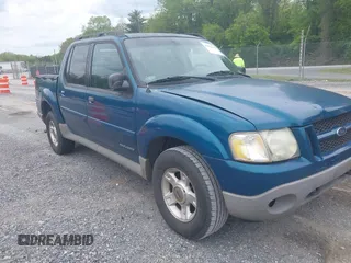 2001 Ford Explorer Sport Trac z VIN 1FMZU77E11UC71161, wystawiony jako IAAI lot #42184342 z przebiegiem 196 240 mil mil oraz . Historia ofert i sprzedaży dostępna na DreamBid. Obrazek 1.