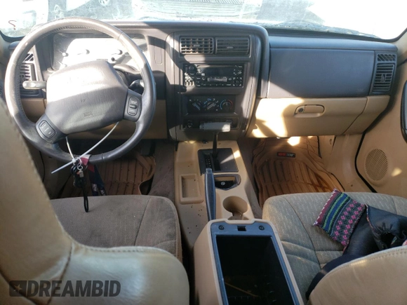 2001 Jeep Cherokee Sport with VIN 1J4FT48S61L522723, listed as a Copart auction lot 87115404 with 0 mi miles and Clean Title. Bid and sale history available at carsss.com. Image 8.