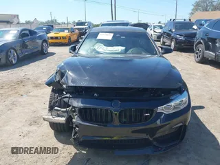 2016 BMW M4 z VIN WBS3R9C51GK708621, wystawiony jako IAAI lot #41678133 z przebiegiem 59 501 mil mil oraz . Historia ofert i sprzedaży dostępna na DreamBid. Obrazek 12.