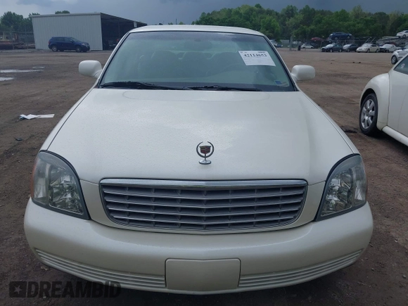 2003 Cadillac DeVille with VIN 1G6KD54Y93U179035, listed as a IAAI auction lot 42114653 with 112,591 mi miles. Bid and sale history available at carsss.com. Image 6.