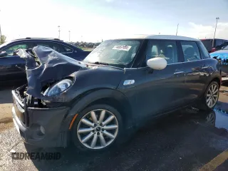 2020 MINI Hardtop 4 Door Cooper S with VIN WMWXU9C02L2M14390, listed as a Copart auction lot 74087104 with Not Provided miles and Salvage Title. Bid and sale history available at DreamBid. Image 1.