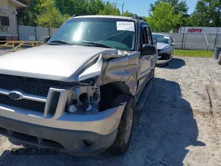 2004 Ford Explorer Sport Trac XLS z VIN 1FMZU67K34UA66302, wystawiony jako IAAI lot #42203931 z przebiegiem 221 245 mil mil oraz . Historia ofert i sprzedaży dostępna na DreamBid. Obrazek 6.