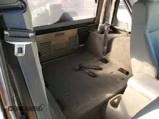 2003 Jeep Wrangler Sahara z VIN 1J4FA59S43P369233, wystawiony jako Copart lot #46517565 z przebiegiem 169 232 mil mil oraz Szkoda całkowita • Salvage title. Historia ofert i sprzedaży dostępna na DreamBid. Obrazek 10.
