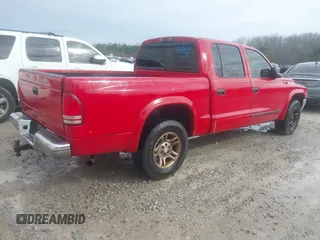 2004 Dodge Dakota SLT with VIN 1D7HL48N44S708625, listed as a IAAI auction lot 41552527 with 337,535 mi miles. Bid and sale history available at carsss.com. Image 4.