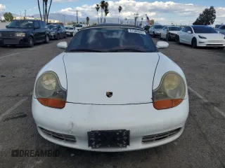 1999 Porsche Boxster z VIN WP0CA2984XU629987, wystawiony jako Copart lot #51366845 z przebiegiem Nie podano mil oraz Czysty tytuł • Clean title. Historia ofert i sprzedaży dostępna na DreamBid. Obrazek 5.